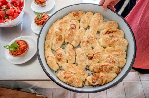 Learning the Macedonian Spirit Through a Cooking Class Learning the techniques of traditional cuisine at a Macedonian cooking class at Risto's Guest House in Lake Ohrid.
