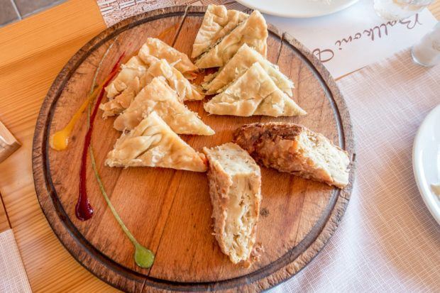 Burek -- a layered, savory pie made with phyllo -- is a common Albania food