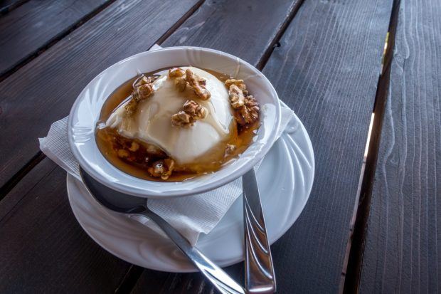 Yogurt with honey and walnuts was one of our favorite foods in Albania. It served as both an Albanian breakfast and snack.