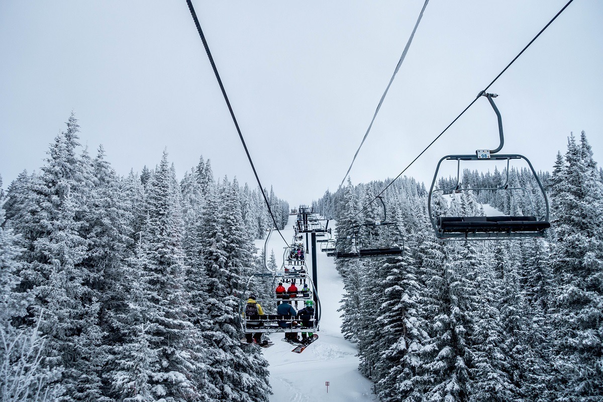 People on a ski lift in the winter at Ski Santa Fe