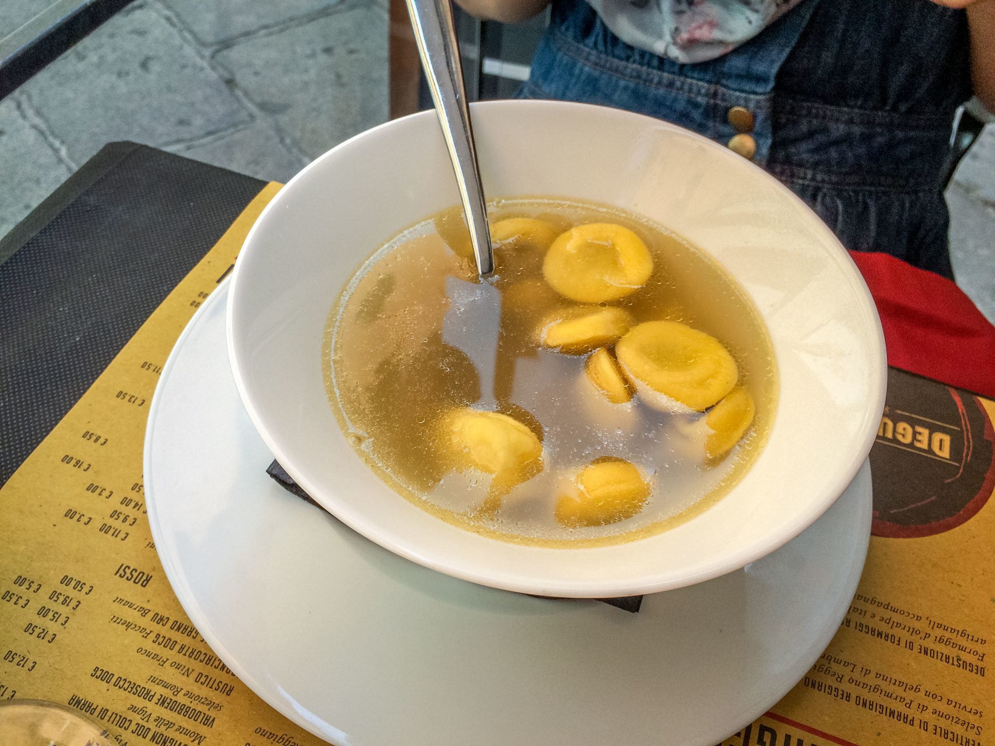 Anolini in brodo, pasta floating in broth