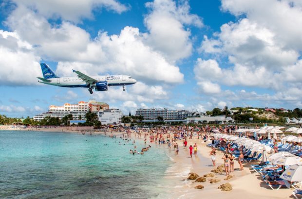 Extreme Aviation at Maho Beach in St. Maarten Jet approaching Maho Beach St. Maarten