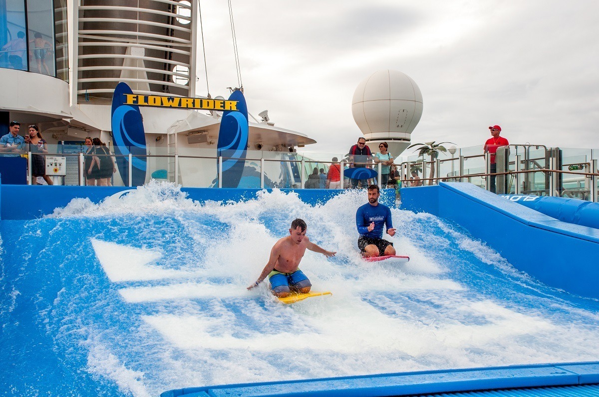 Boy using a Flowrider on a Royal Caribbean cruise