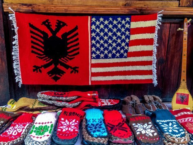 Albanian and American flags woven together in an Albania bazaar