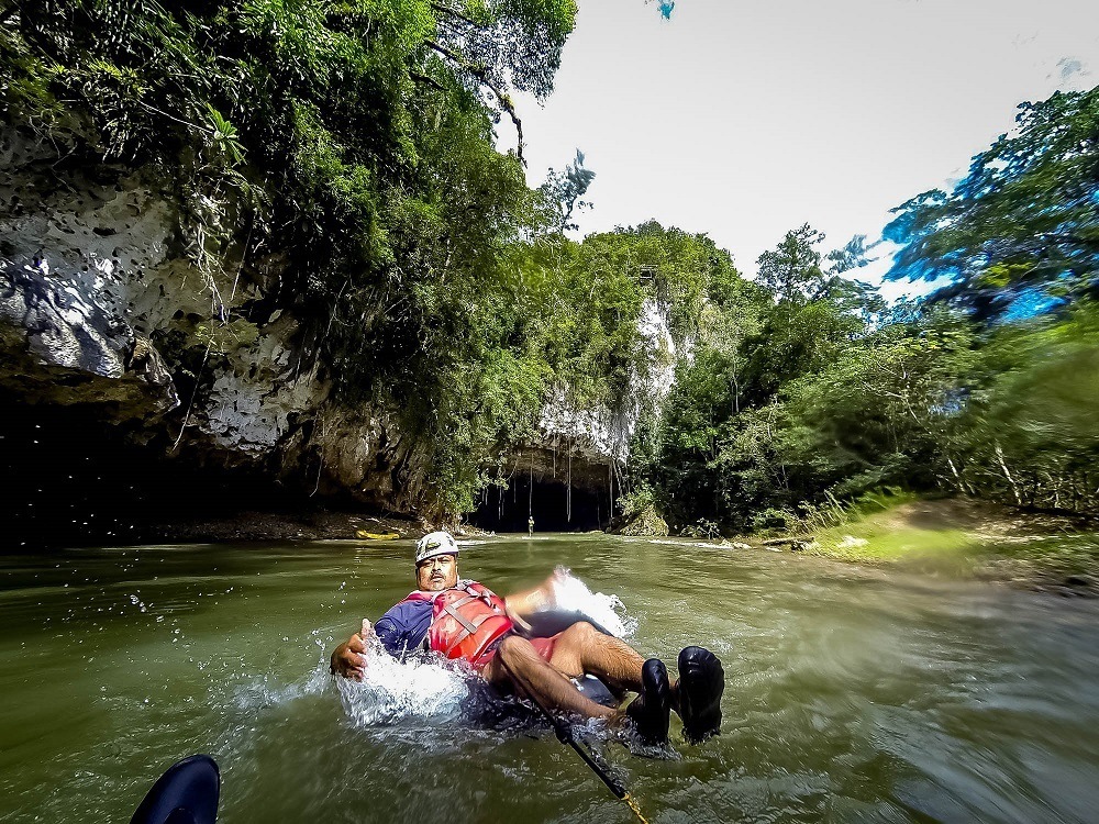 Guide leading us tubing on a river