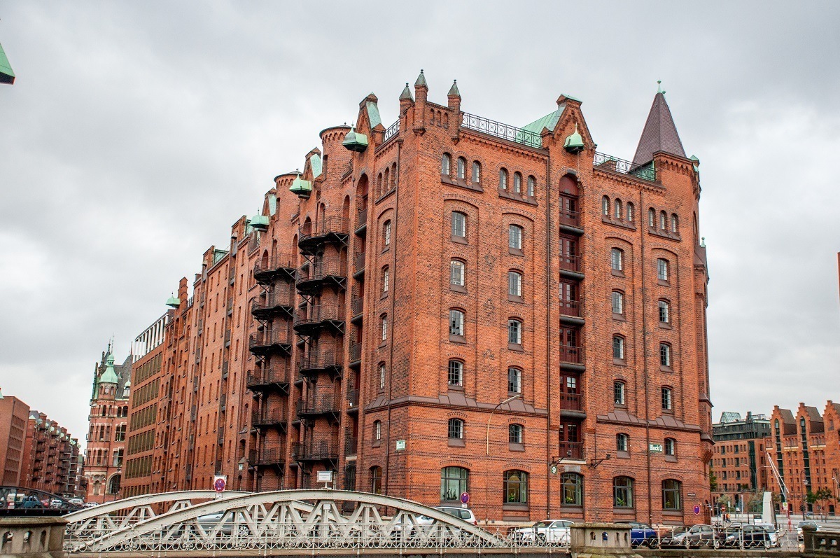 Red brick warehouses connected by a bridge