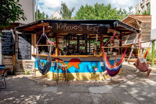 The swings at the bar make a great place to enjoy Koleves kert Budapest, Hungary