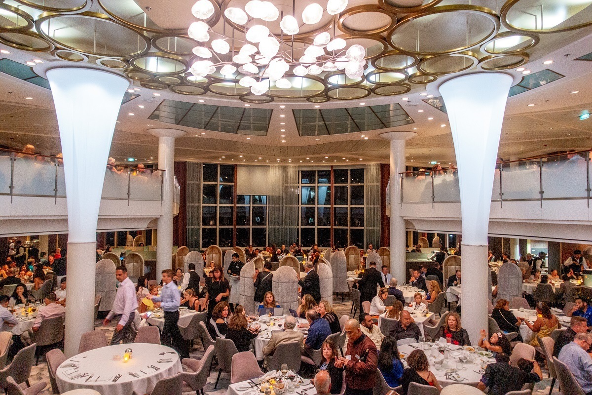 Main dining room full of people on cruise