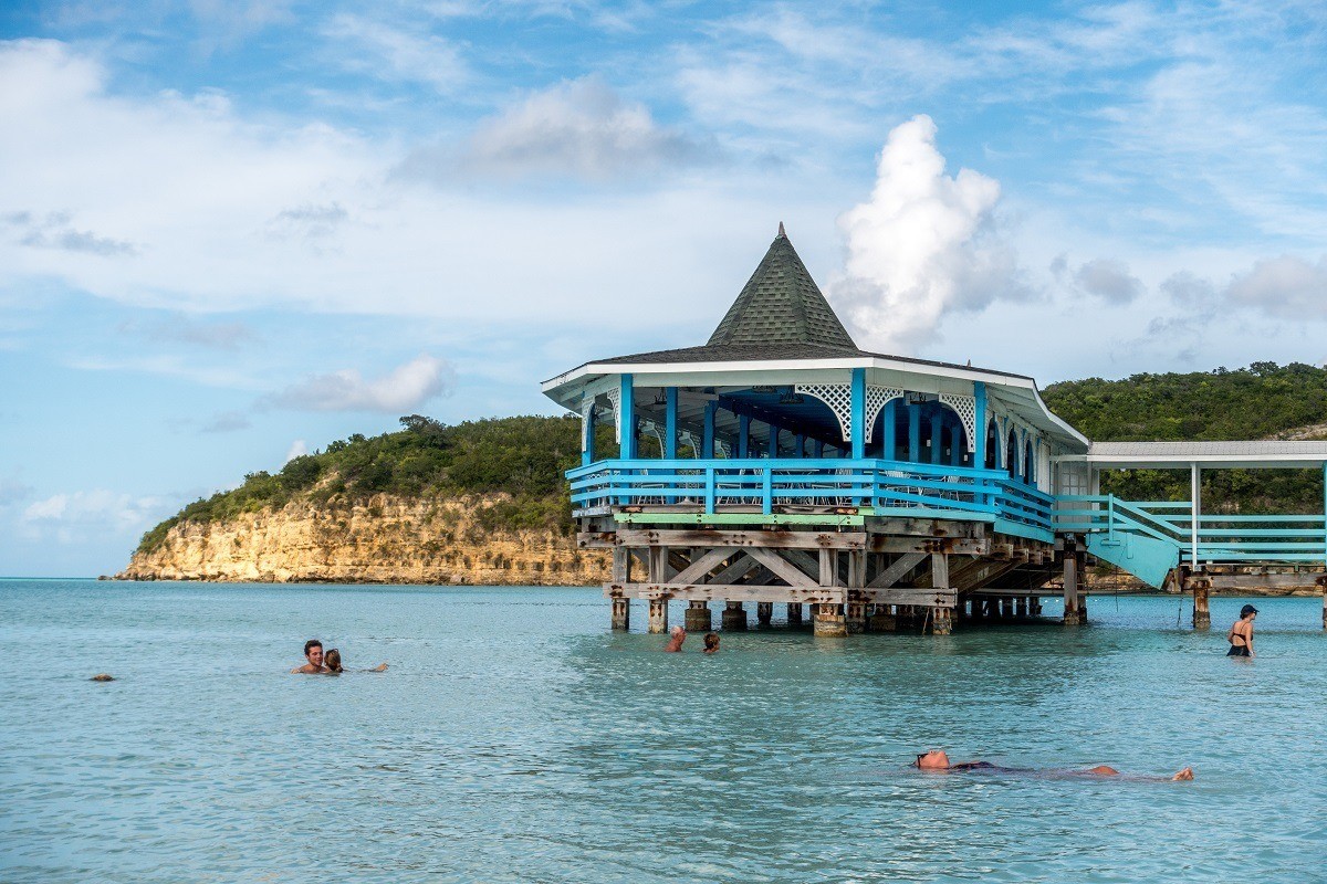 The blue pier on Dickenson Bay Beach in Antigua