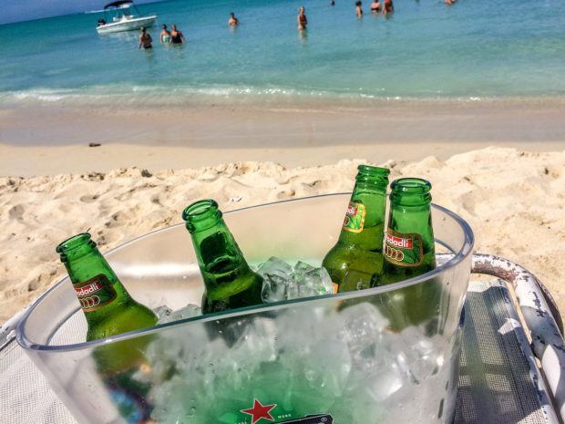 Enjoying a Wadadli beer in Antigua.