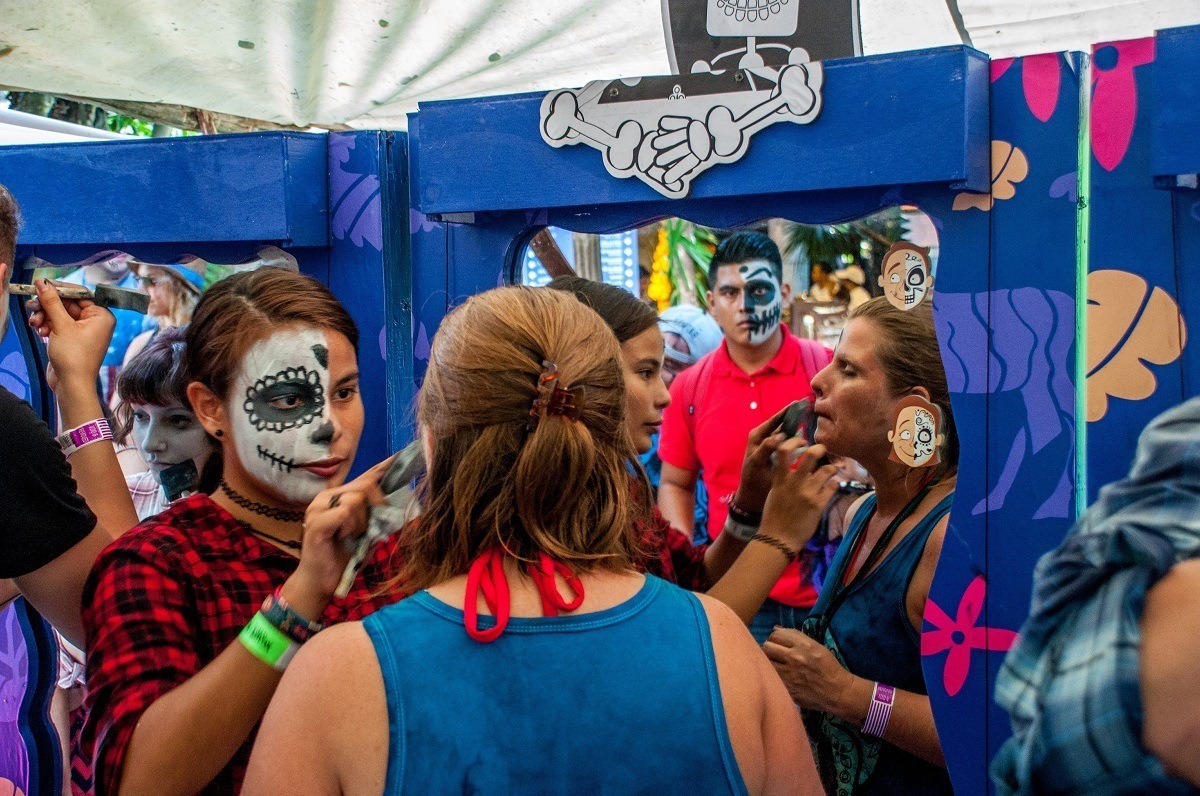 Getting ready for the Day of the Dead in Mexico with face paint