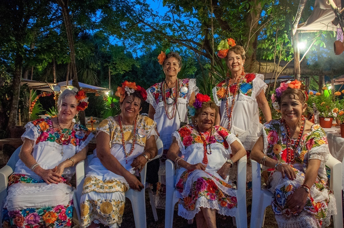 Women at Xcaret dressed for the Day of the Dead festival