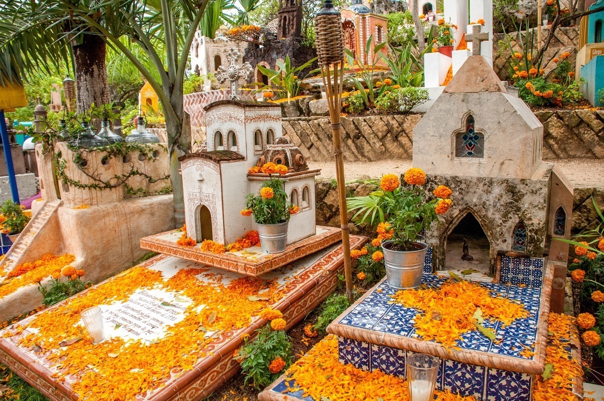 Cemetery decorated with marigolds for Day of the Dead