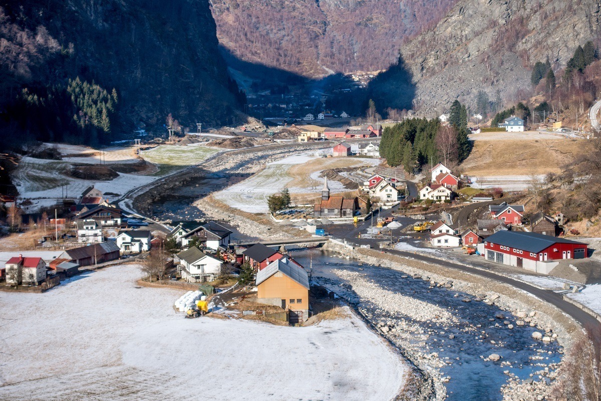 View of houses in a valley while taking the Flam Railway, one of the best things to do in Norway
