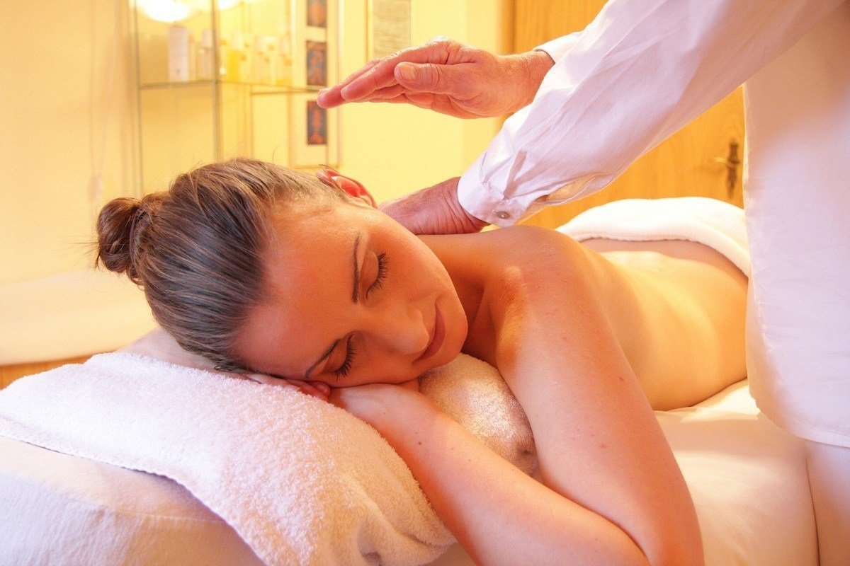 A woman receiving a massage treatment