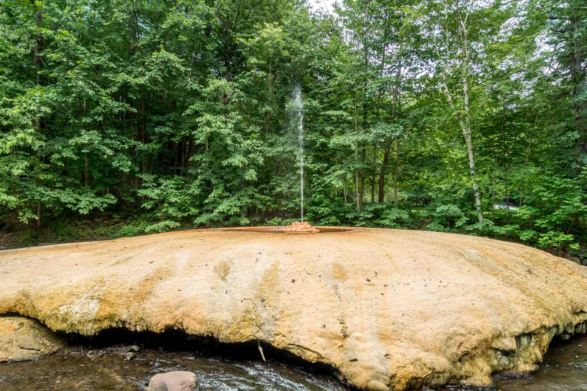 Geyser island spouter is one of the most popular springs in Saratoga Springs, NY. A visit here is one of the cool Saratoga Springs things to do