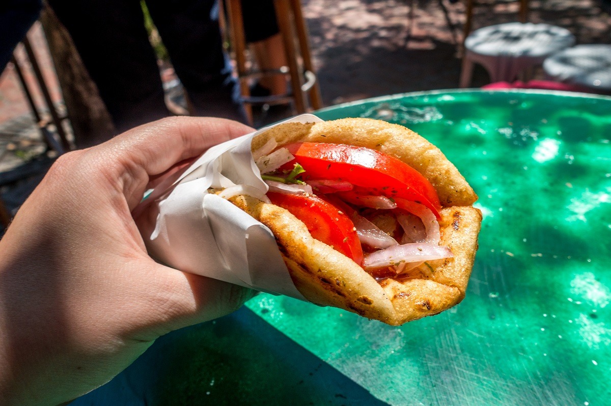 Souvlaki, meat and vegetables wrapped in Greek pita