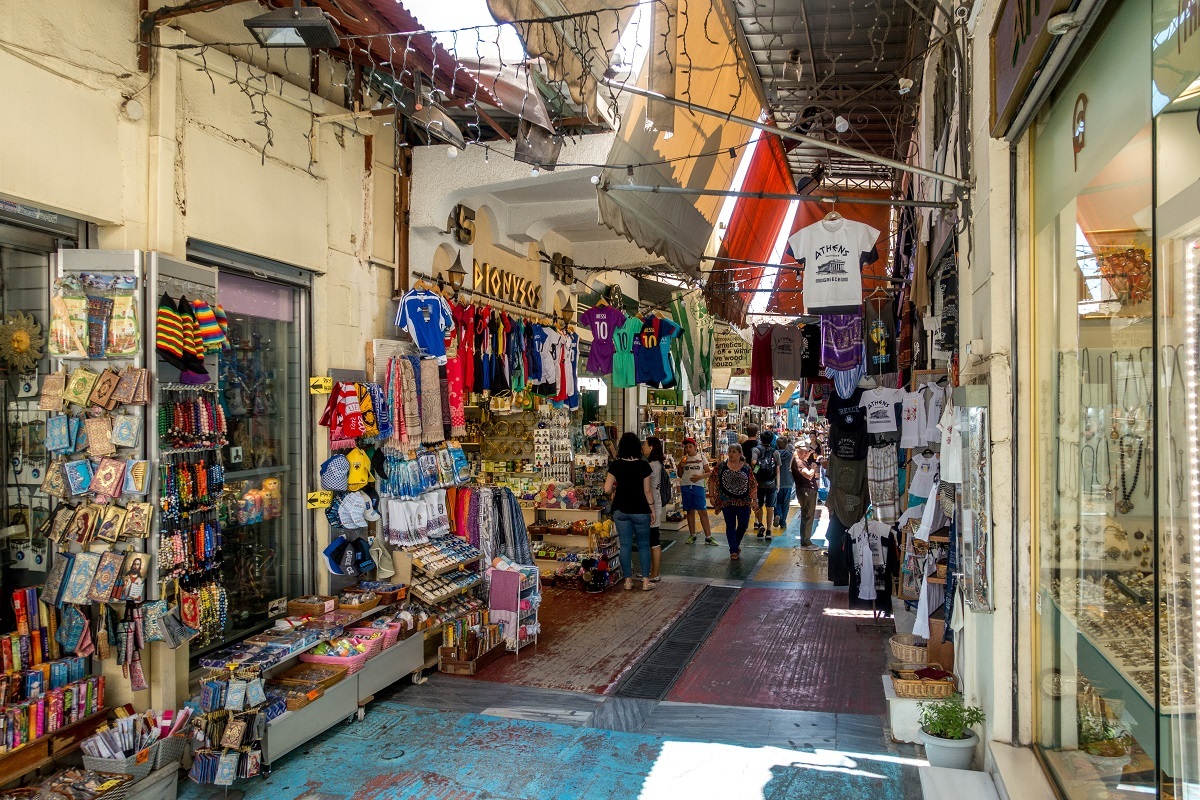 People visiting souvenir stores in the Monastiraki neighborhood
