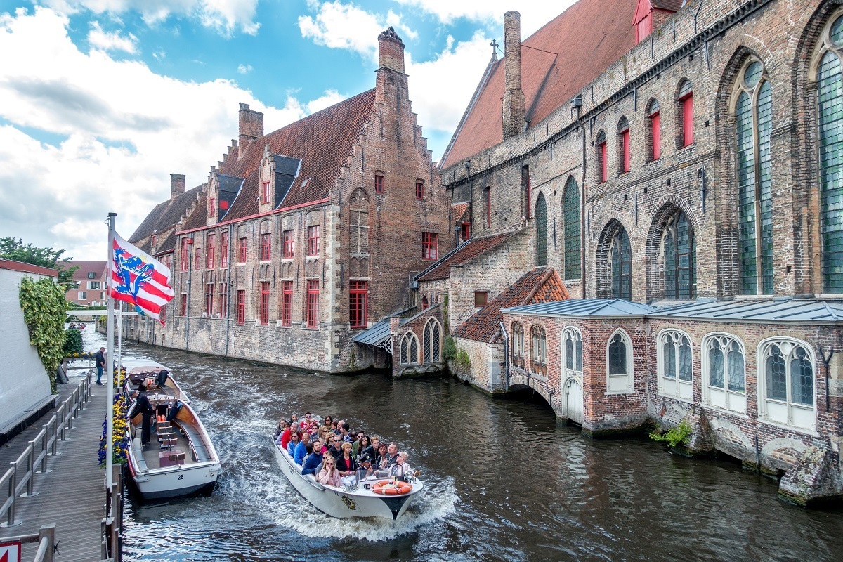 visit bruges or ghent