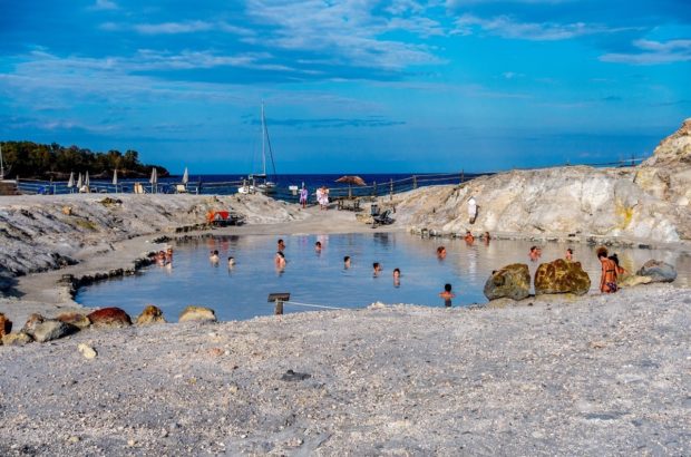 Slipping into the Vulcano Island Mud Baths Everything you need to know to visit the Vulcano Island mud baths in Italy. This includes things to do on Vulcano Island, how to get to Vulcano Island, tips for visiting the mud baths and hot springs, and also how to get to the black sand beach.