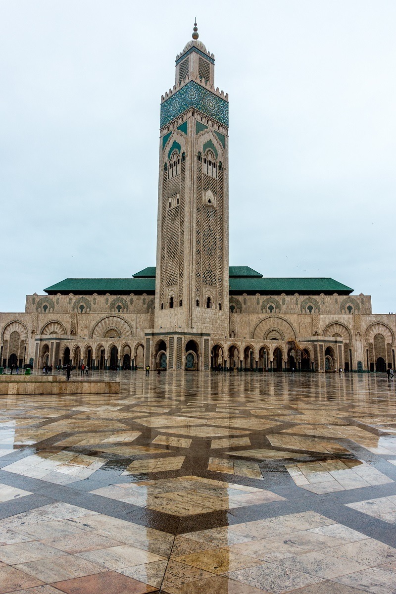 Green and brown minaret of Hassan II Mosque in Casablanca, a Morocco must see