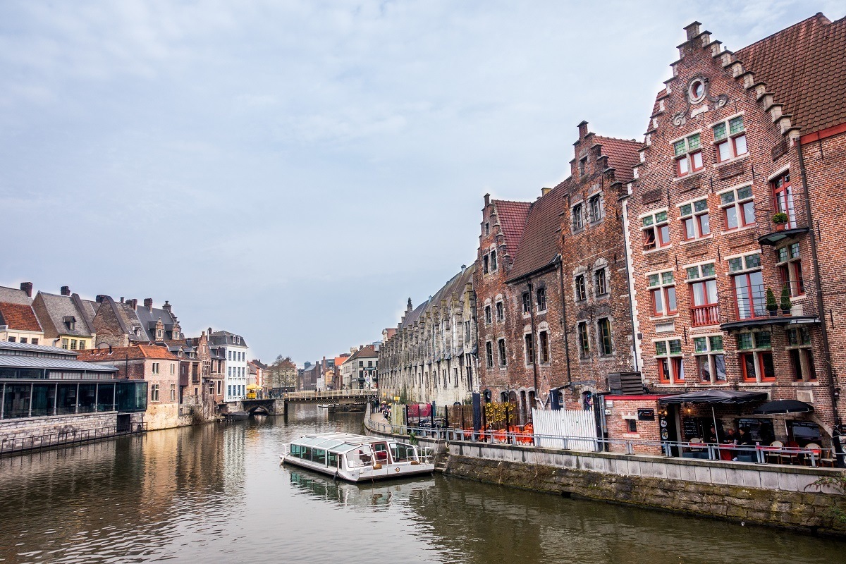 Boat in a canal lined with buildings