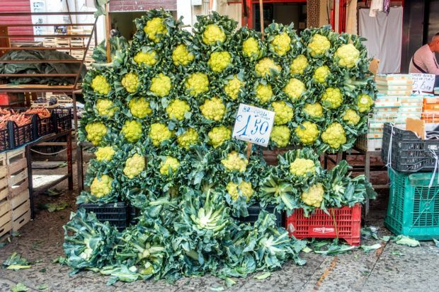 Broccoli on display along a wall in the Ballaro market in Palermo Sicily