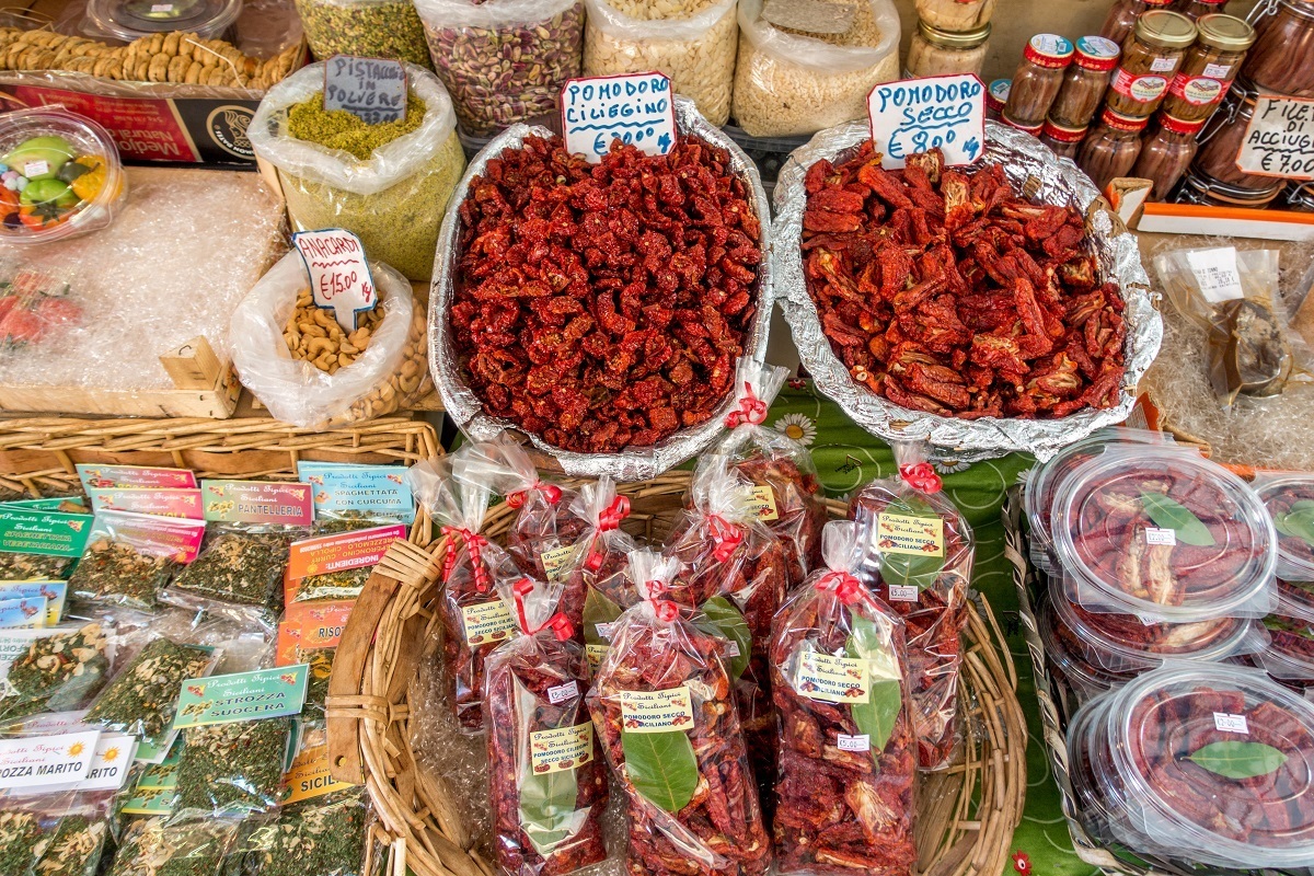 Sundried tomatoes and spices at the Capo market in Palermo, Italy.
