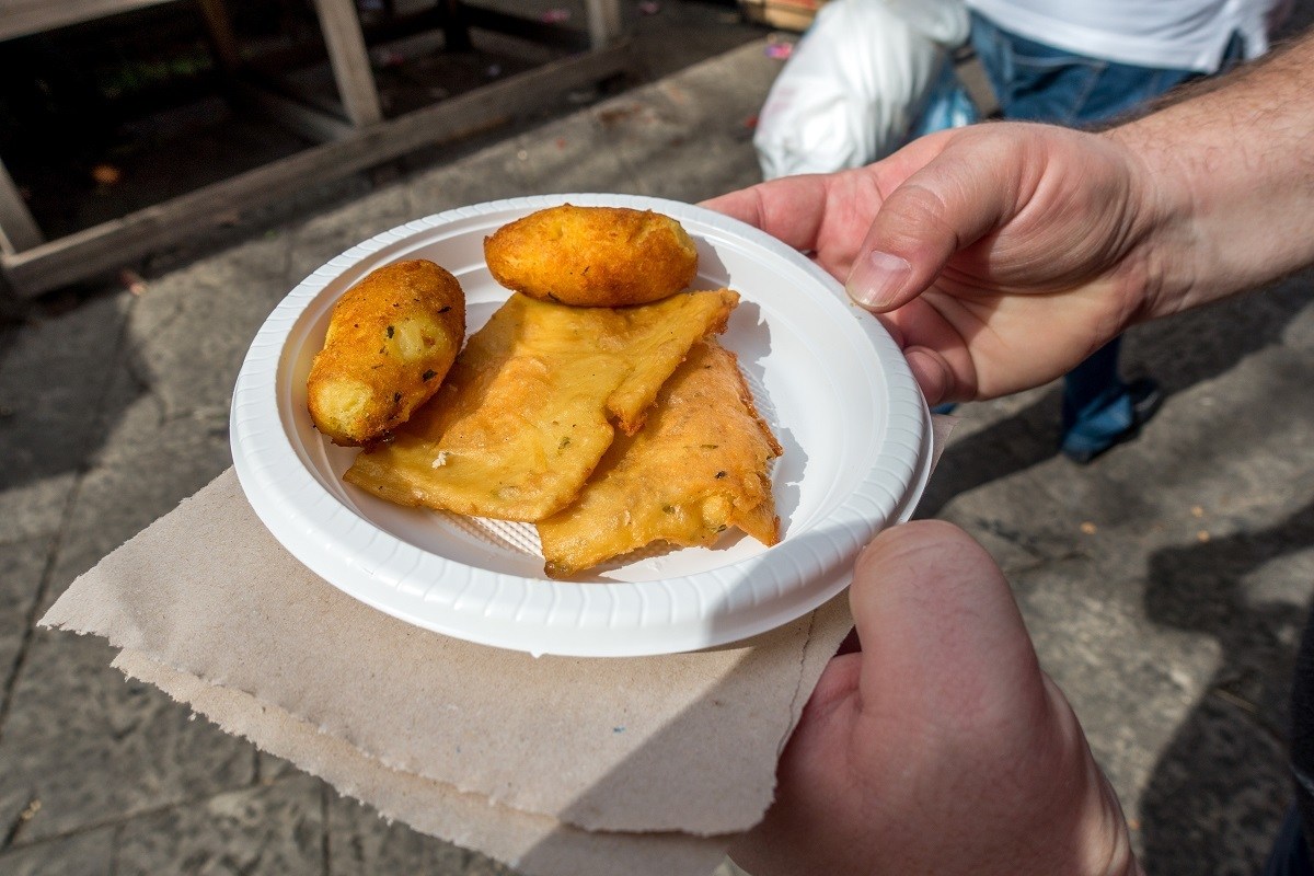 Crocche and panelle are common Palermo street food available in the city's historic food markets