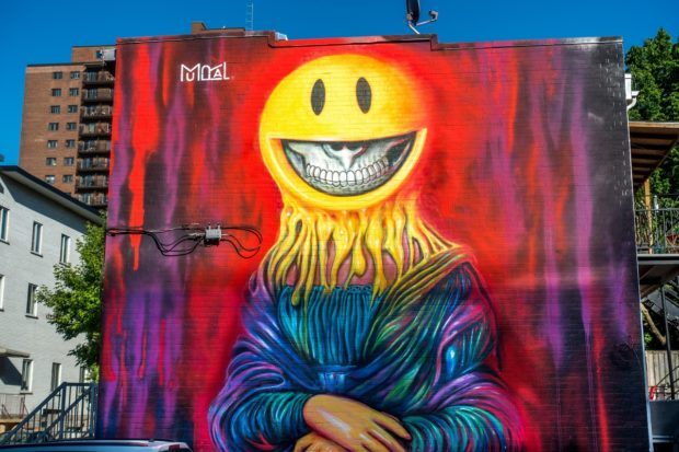 Wondering what to do in Montreal Canada? Go check out the street art like this mural by Ron English