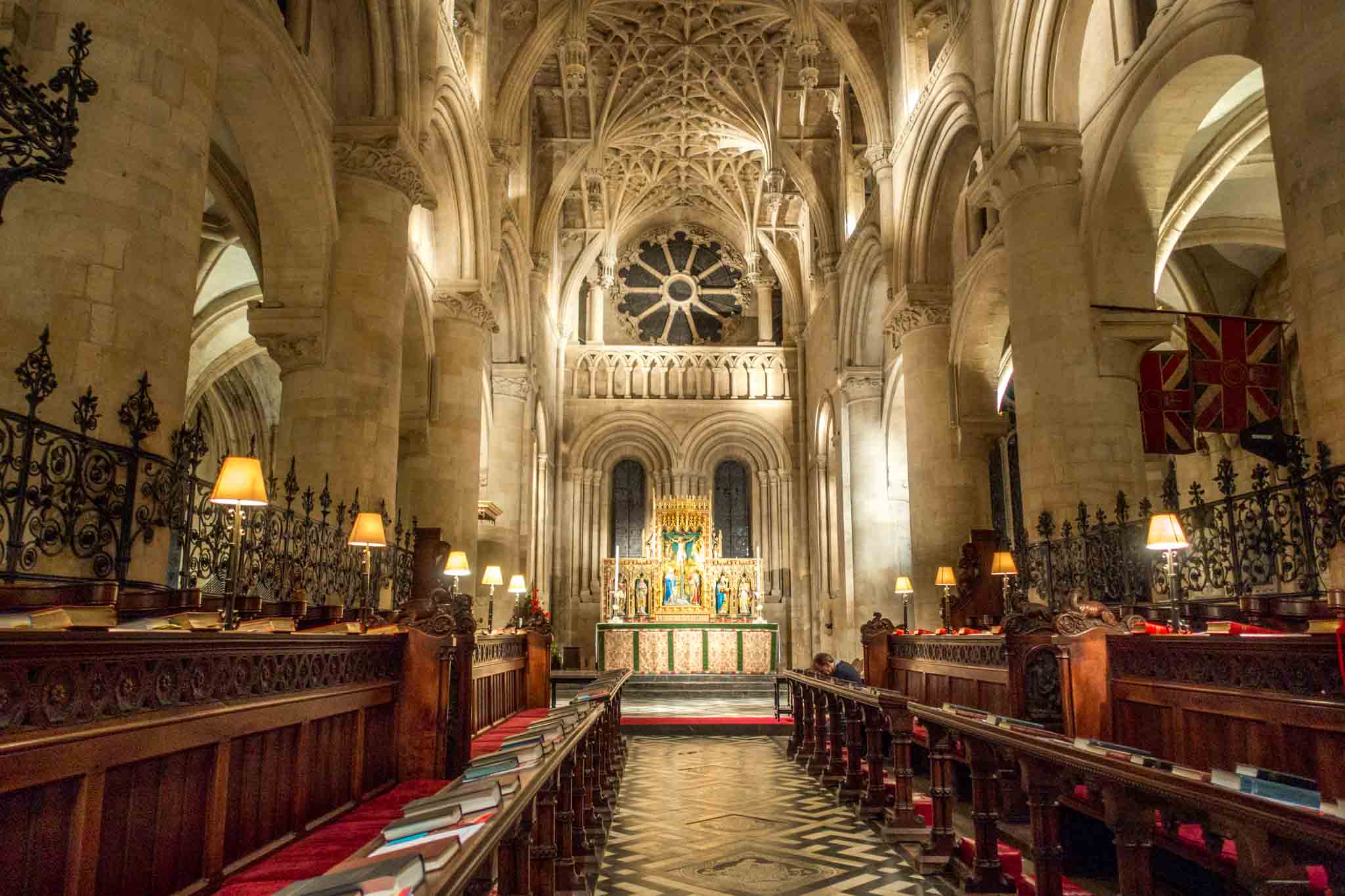 Rows of pews and altar in Christ Church Cathedral at night