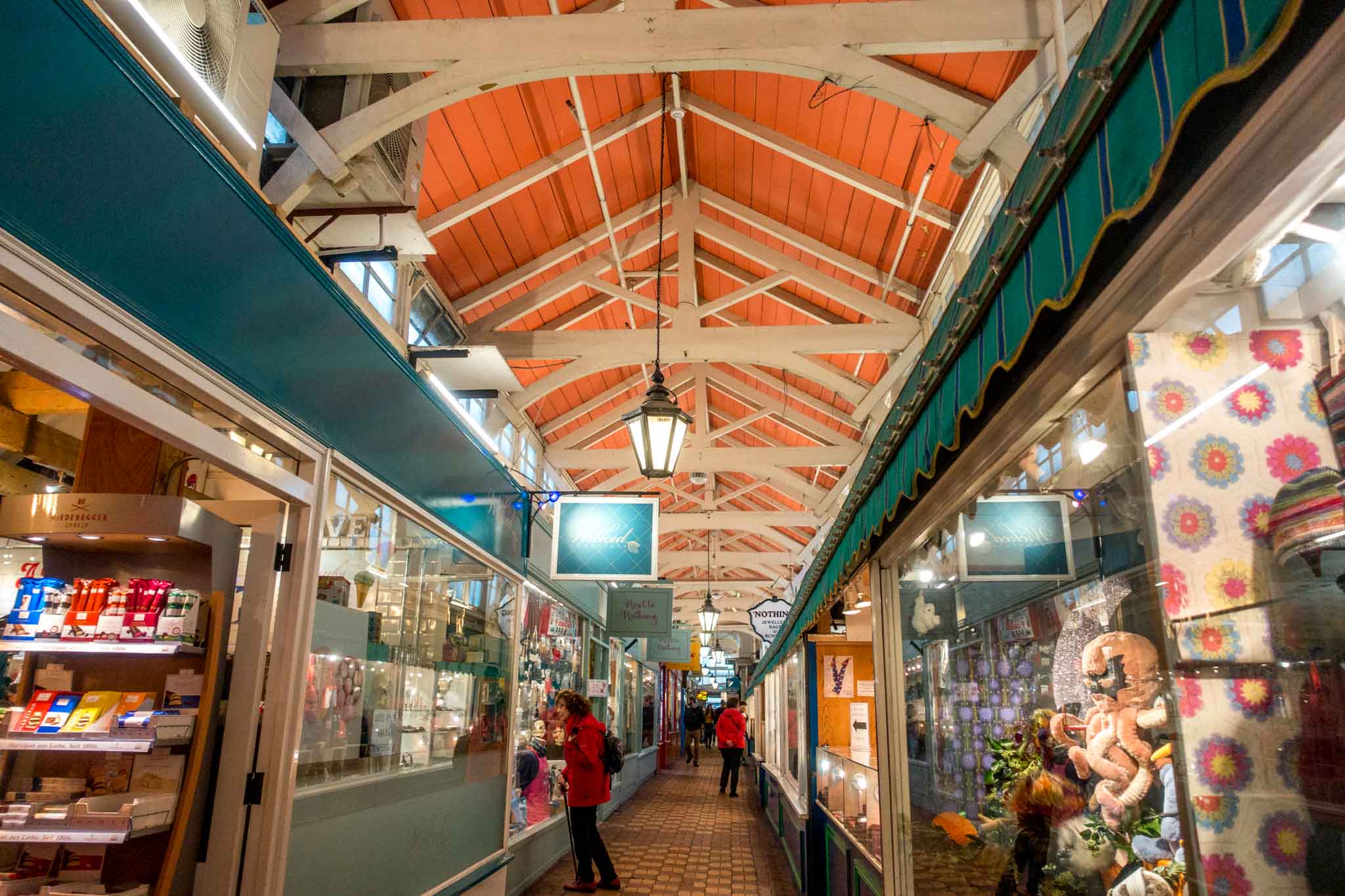 Stores and people shopping at the Oxford Covered Market