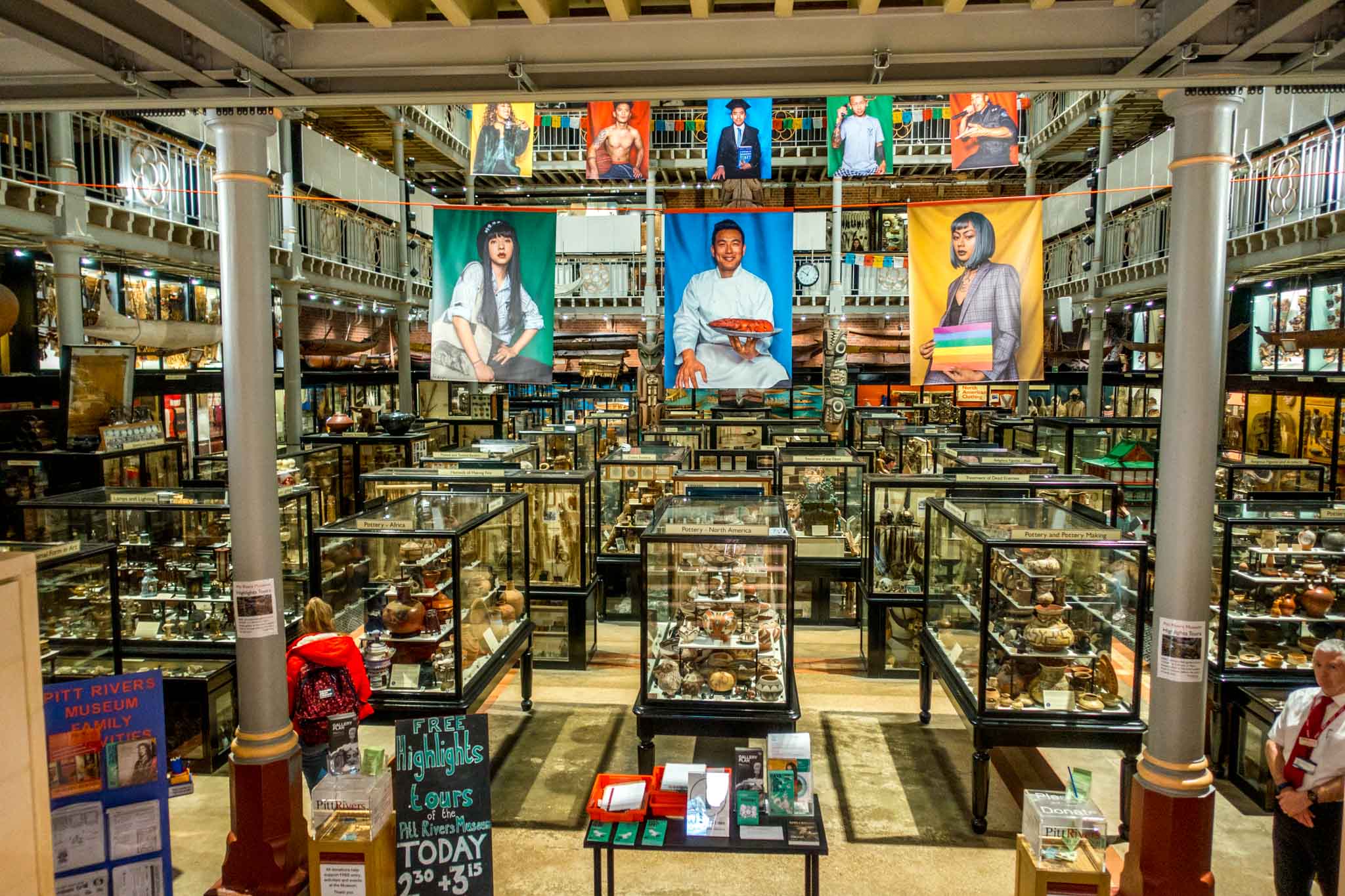Cases full of artifacts in a room at the Pitt Rivers Museum
