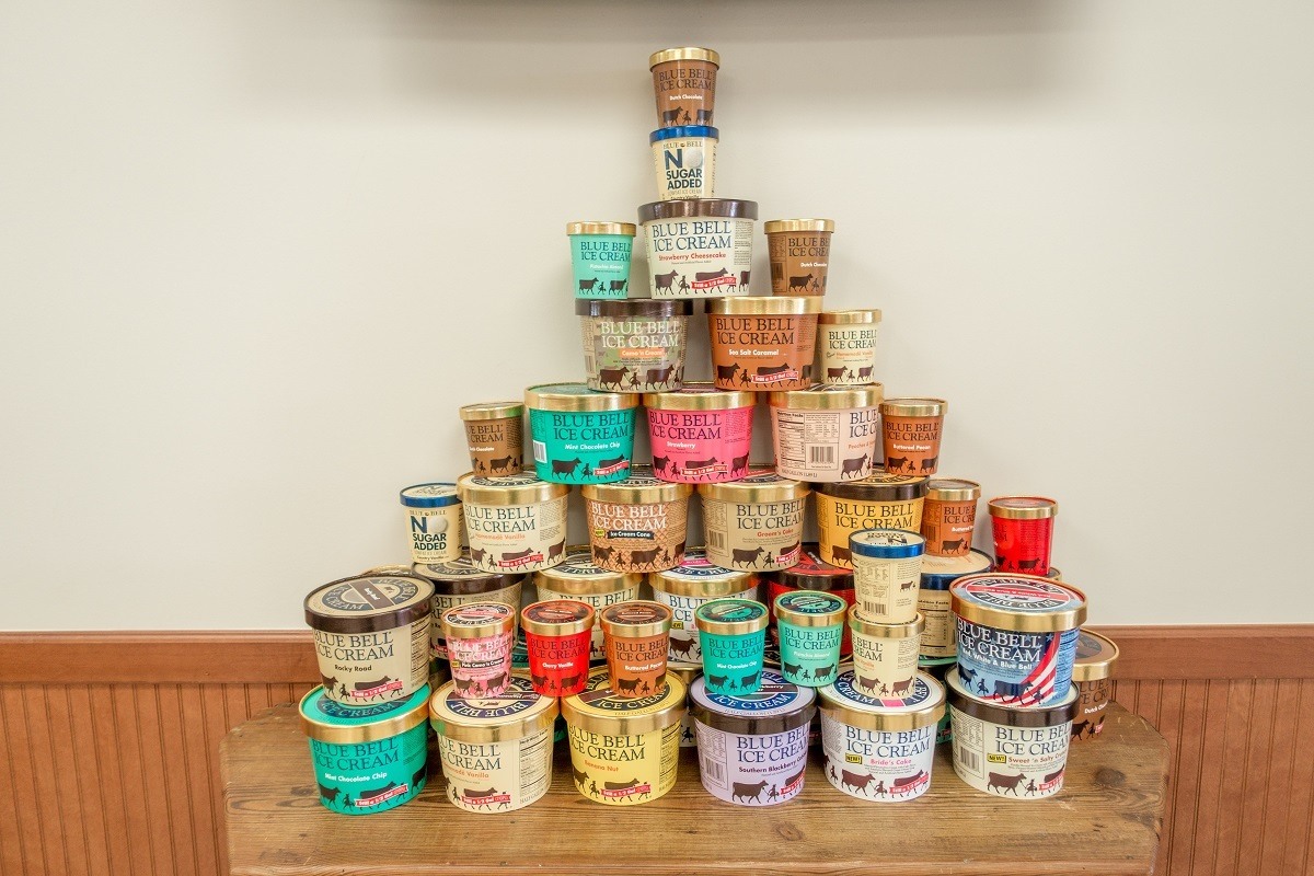 Stacked containers of of Blue Bell ice cream