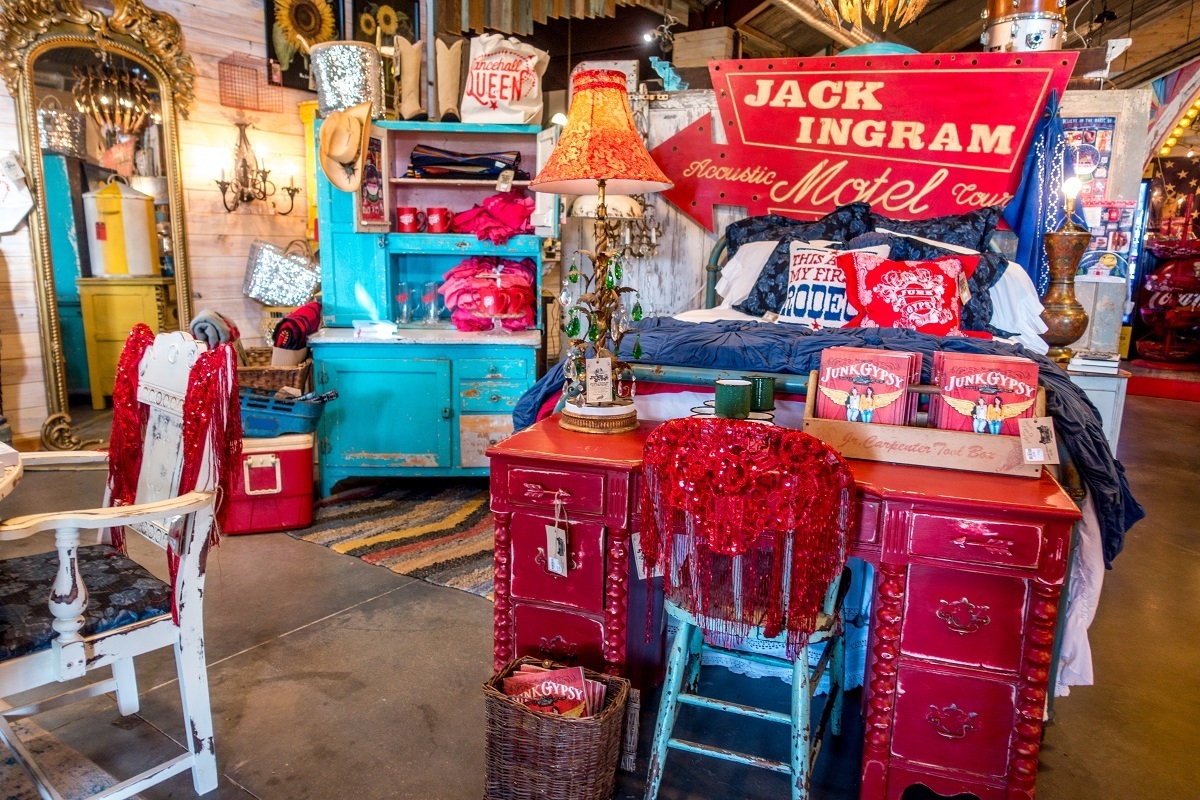 Displays of colorful home decor for sale at Junk Gypsy