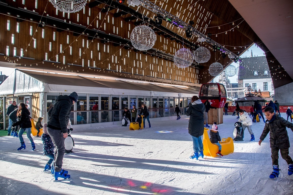 People skating on ice rink at the city pavilion in Ghent