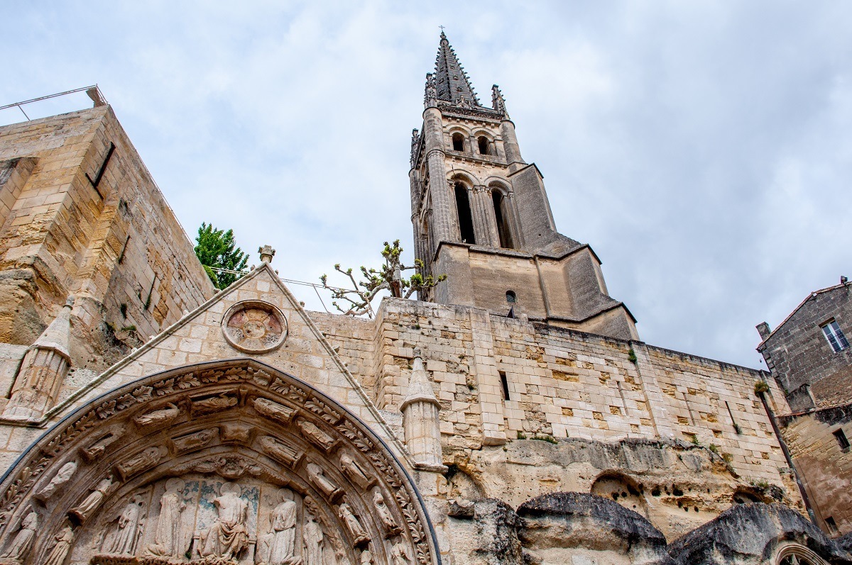 Stone exterior and bell tower of the Monolithic Church in St Emilion