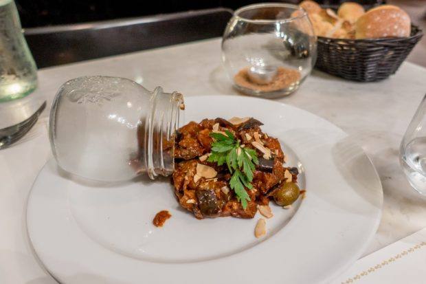 Kapunata, a vegan food in Malta, is made of tomatoes, eggplant, garlic, and other flavorful ingredients