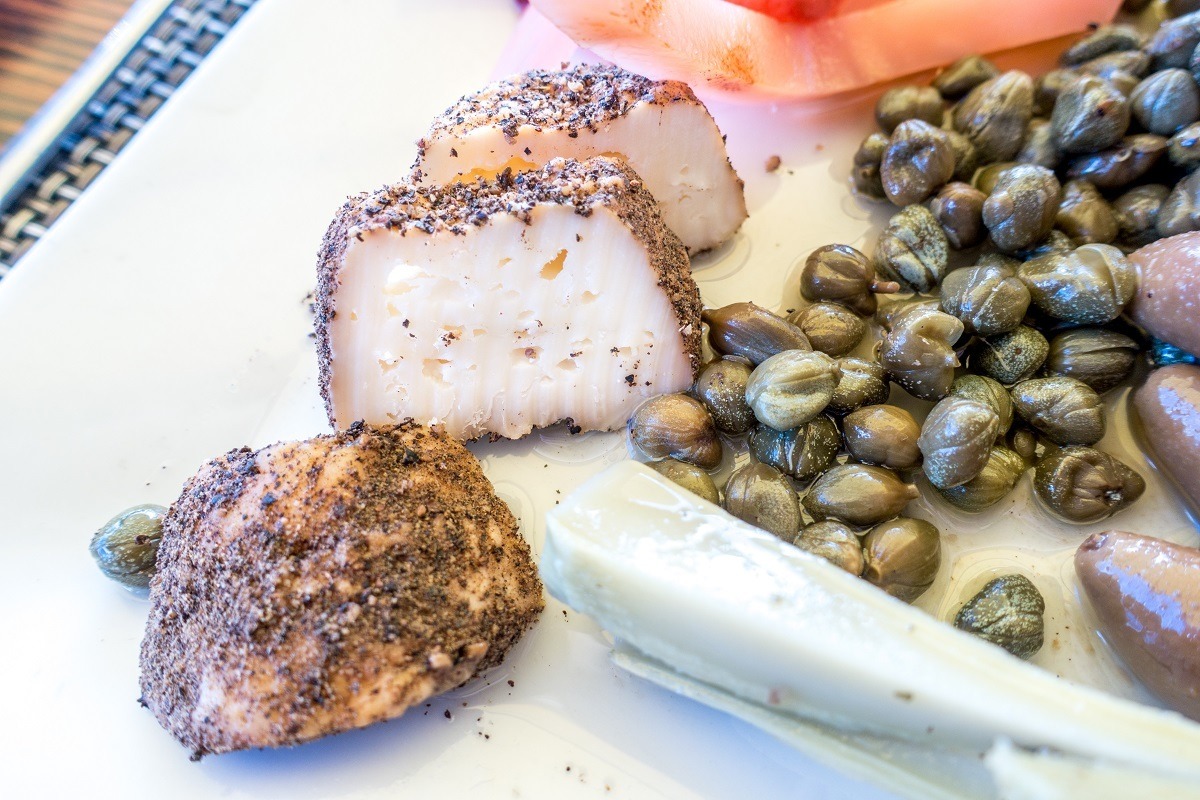 Maltese cheese known as gbejna, coated in pepper