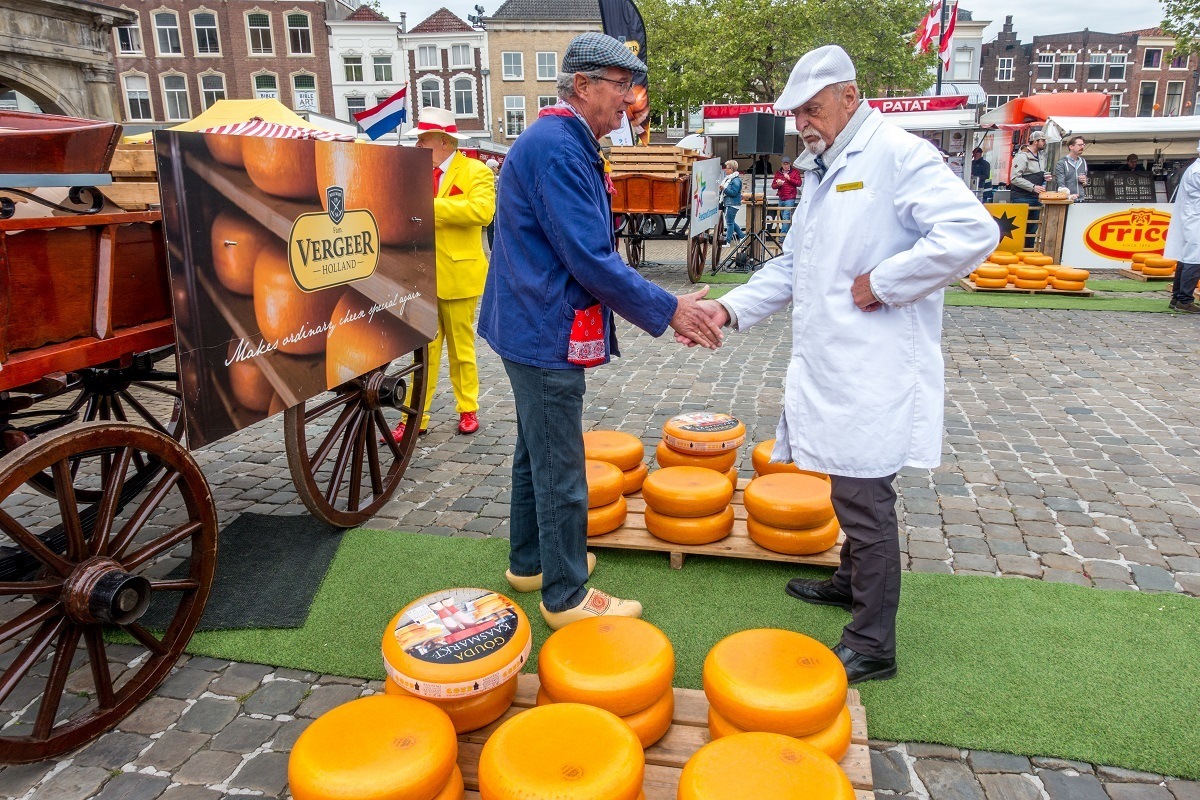 Men negotiating over cheese prices