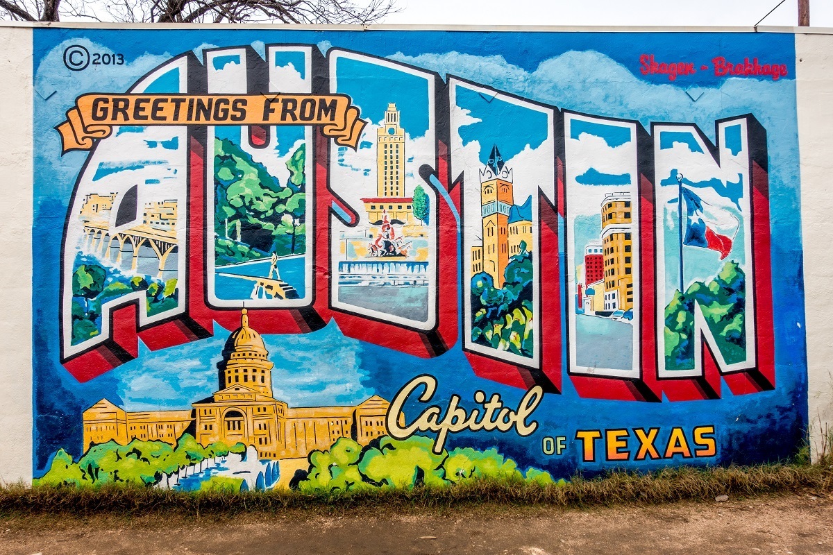 Looking for street art like the colorful, postcard-style "Greetings from Austin" mural is one of the fun Austin activities to do