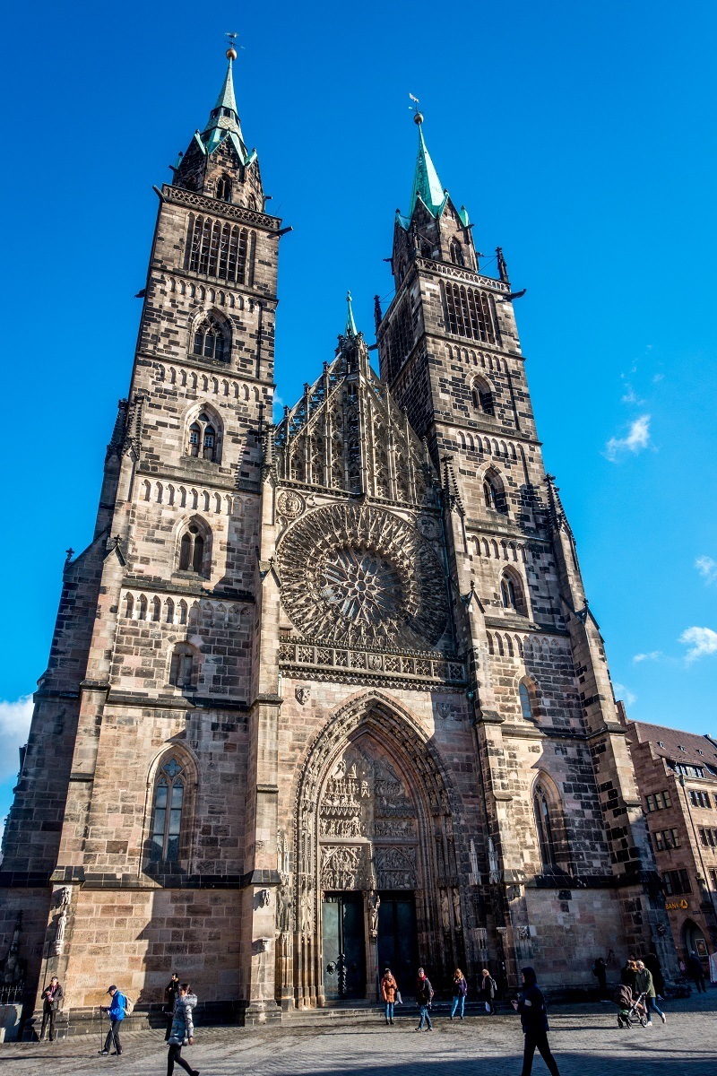 St Lorenzkirche church with two towers and ornate stained glass window