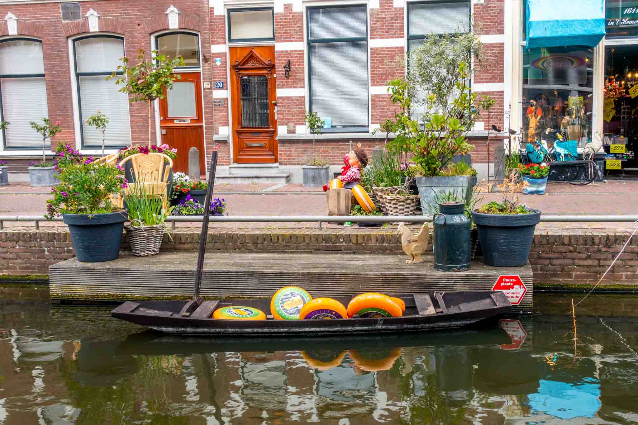 Faux cheese wheels in a boat in Gouda Netherlands