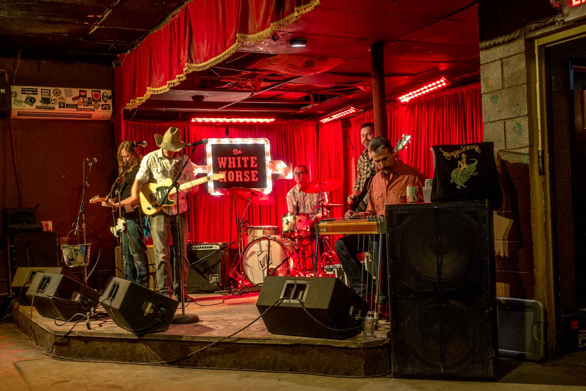 Band playing on stage at The White Horse