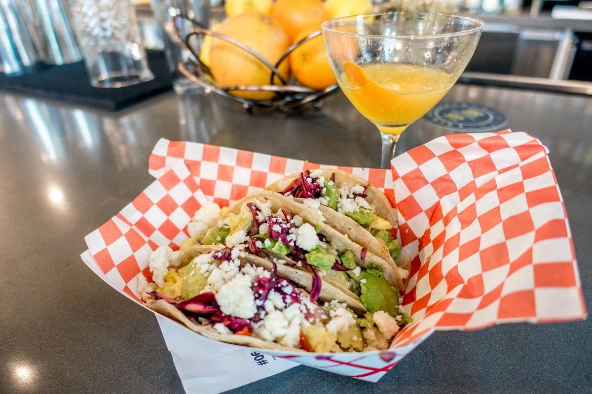 Tacos and mimosa on a table