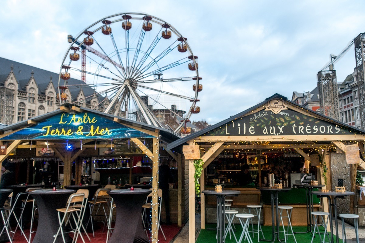 Market stalls and Ferris wheel