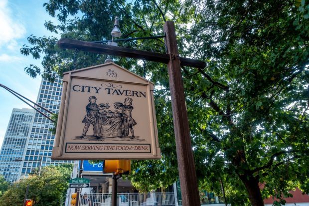 Sign for the historic City Tavern in Old City. The 18th-century pub is where to go in Philadelphia for lovers of history.