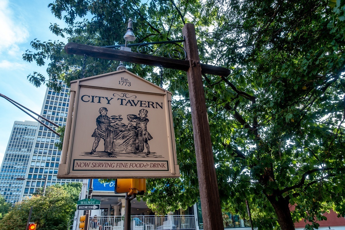 Sign for the historic City Tavern in Old City. The 18th-century pub is where to go in Philadelphia for lovers of history.