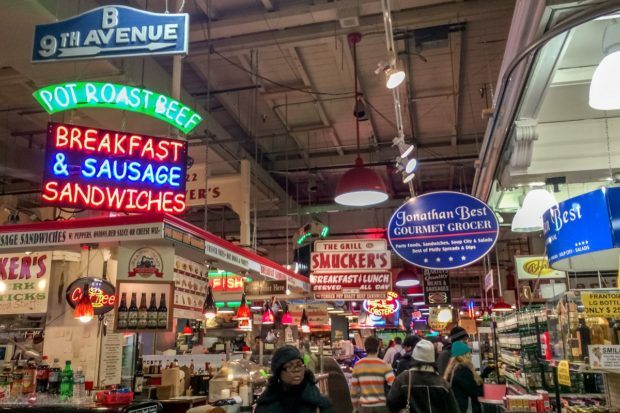 Signs inside Reading Terminal Market. A visit here is one of the best things to do in Philly.