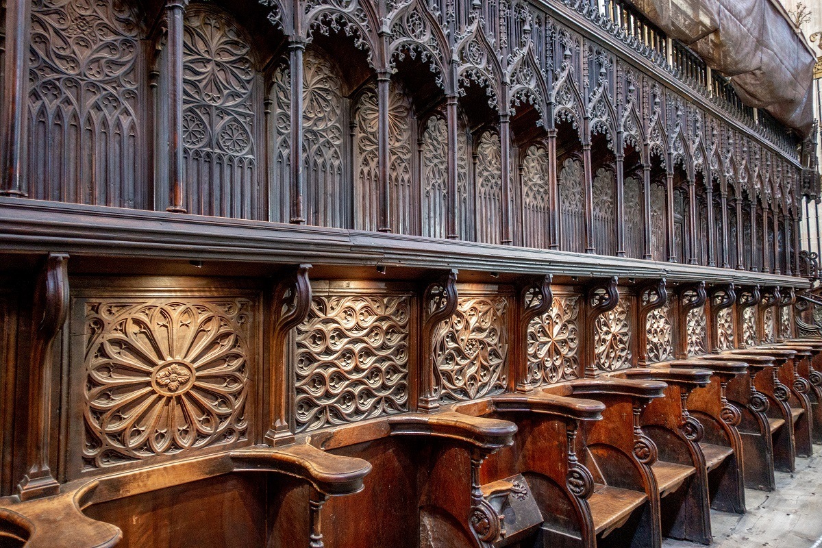 The ornately-carved wooden choir inside the Segovia Cathedral, a 16th-century UNESCO World Heritage Site in Spain